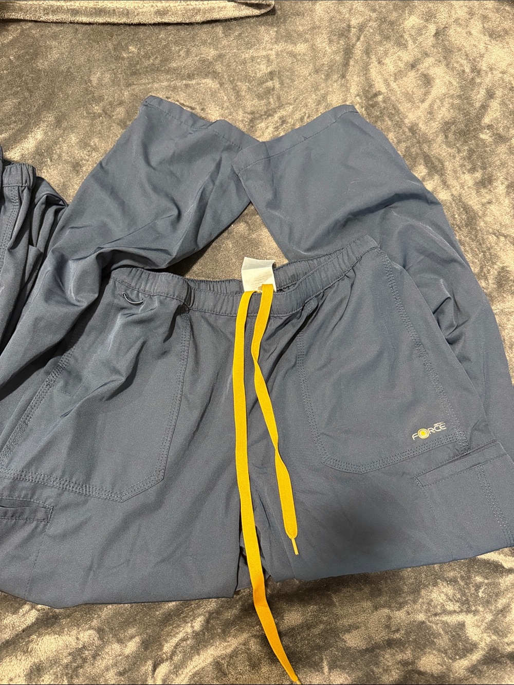 Women’s Medium Carhartt straight leg navy scrub pants.